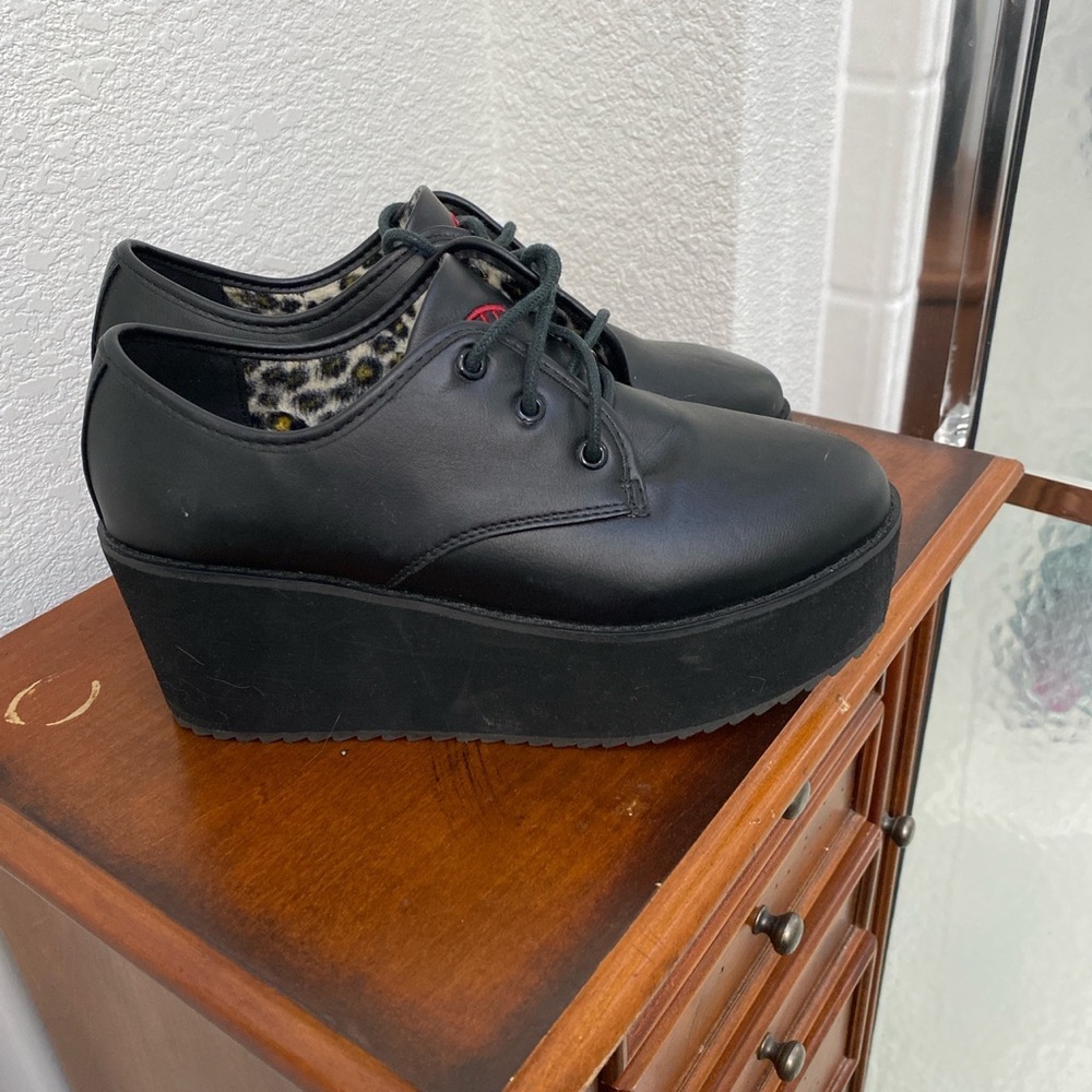 Strange Cvlt black creepers. About four inches tall. Leopard print inside.